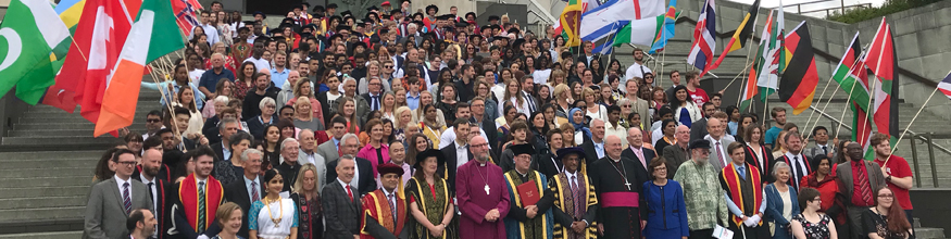 group of people outside cathedral